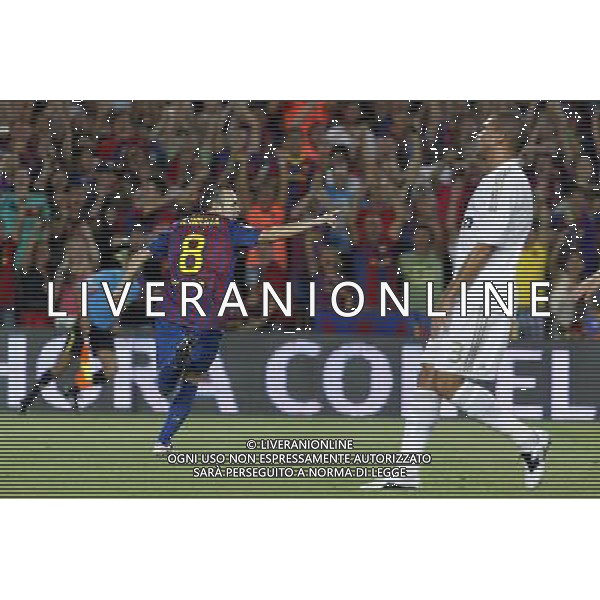 FC Barcelona\'s Andres Iniesta celebrate goal in presence of Real Madrid\'s Pepe (r) dejected during Spanish Supercup 2nd match.August 17,2011. Photo: Acero / Alter / ALFAQUI Photo: Acero / Alter / ALFAQUI