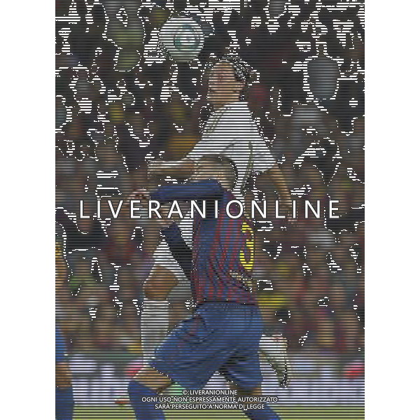 FC Barcelona\'s Gerard Pique (d) and Real Madrid\'s Mesut Ozil during Spanish Supercup 2nd match.August 17,2011. Photo: Acero / Alter / ALFAQUI Photo: Acero / Alter / ALFAQUI