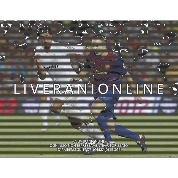 FC Barcelona\'s Andres Iniesta (r) and Real Madrid\'s Sami Khedira during Spanish Supercup 2nd match.August 17,2011. Photo: Acero / Alter / ALFAQUI Photo: Acero / Alter / ALFAQUI