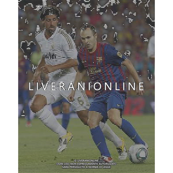 FC Barcelona\'s Andres Iniesta (r) and Real Madrid\'s Sami Khedira during Spanish Supercup 2nd match.August 17,2011. Photo: Acero / Alter / ALFAQUI Photo: Acero / Alter / ALFAQUI
