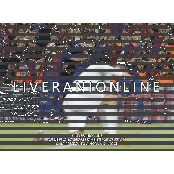 FC Barcelona\'s players celebrates goal in presence of Real Madrid\'s Cristiano Ronaldo (c) dejected during Spanish Supercup 2nd match.August 17,2011. Photo: Acero / Alter / ALFAQUI Photo: Acero / Alter / ALFAQUI