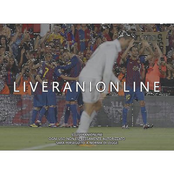 FC Barcelona\'s players celebrates goal in presence of Real Madrid\'s Cristiano Ronaldo (c) dejected during Spanish Supercup 2nd match.August 17,2011. Photo: Acero / Alter / ALFAQUI Photo: Acero / Alter / ALFAQUI