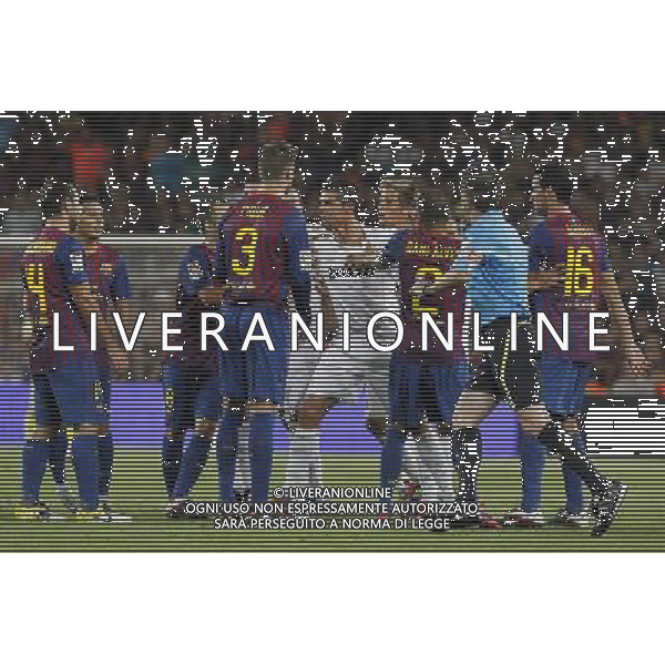 FC Barcelona\'s Javier Mascherano, Pedro Rodriguez, Andres Iniesta, Gerard Pique, Daniel Alves and Sergio Busquets have words with Real Madrid\'s Pepe, Xabi Alonso, Cristiano Ronaldo and Fabio Coentrao during Spanish Supercup 2nd match.August 17,2011. Photo: Acero / Alter / ALFAQUI Photo: Acero / Alter / ALFAQUI