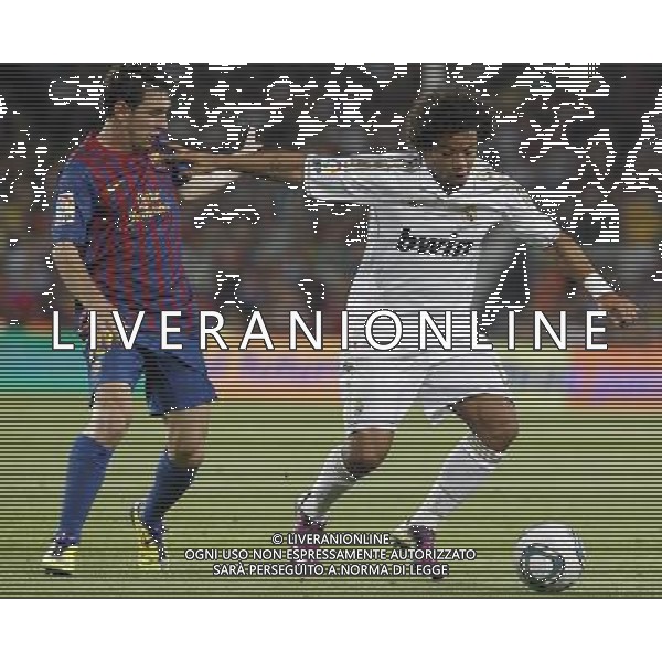 FC Barcelona\'s Leo Messi (l) and Real Madrid\'s Marcelo Vieira during Spanish Supercup 2nd match.August 17,2011. Photo: Acero / Alter / ALFAQUI Photo: Acero / Alter / ALFAQUI