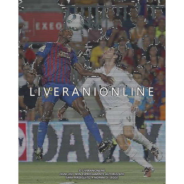 FC Barcelona\'s Eric Abidal (l) and Real Madrid\'s Sergio Ramos during Spanish Supercup 2nd match.August 17,2011. Photo: Acero / Alter / ALFAQUI Photo: Acero / Alter / ALFAQUI