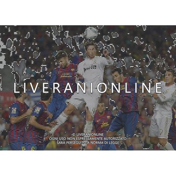 FC Barcelona\'s Javier Mascherano, Xavi Hernandez, Gerard Pique, Daniel Alves and Sergio Busquets and Real Madrid\'s Sergio Ramos and Cristiano Ronaldo during Spanish Supercup 2nd match.August 17,2011. Photo: Acero / Alter / ALFAQUI Photo: Acero / Alter / ALFAQUI