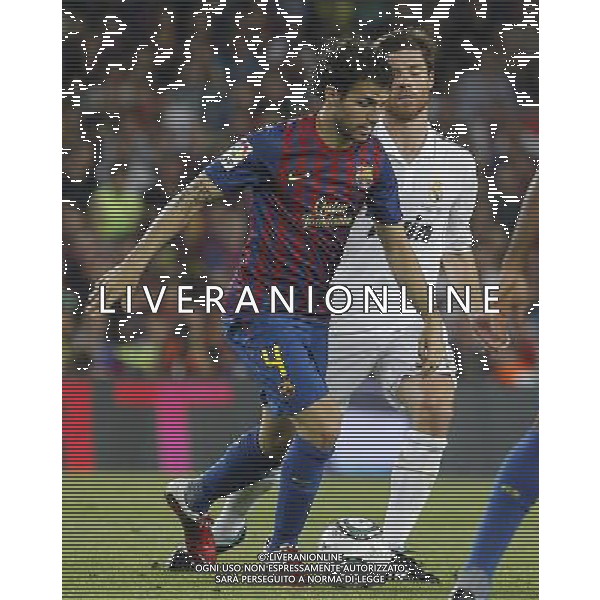 FC Barcelona\'s Cesc Fabregas (l) and Real Madrid\'s Xabi Alonso during Spanish Supercup 2nd match.August 17,2011. Photo: Acero / Alter / ALFAQUI Photo: Acero / Alter / ALFAQUI