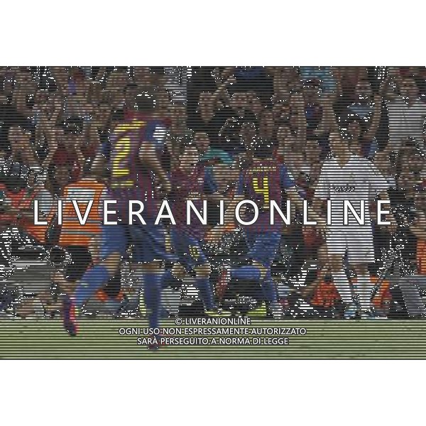 FC Barcelona\'s Daniel Alves, Leo Messi and Cesc Fabregas celebrates goal in presence of Real Madrid\'s Ricardo Carvalho (r)dejected during Spanish Supercup 2nd match.August 17,2011. Photo: Acero / Alter / ALFAQUI Photo: Acero / Alter / ALFAQUI