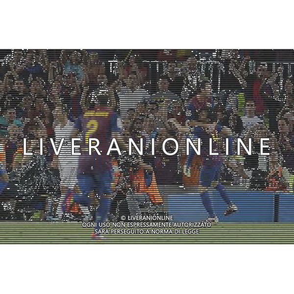 FC Barcelona\'s Daniel Alves, Leo Messi and Cesc Fabregas celebrates goal in presence of Real Madrid\'s Ricardo Carvalho (l)dejected during Spanish Supercup 2nd match.August 17,2011. Photo: Acero / Alter / ALFAQUI Photo: Acero / Alter / ALFAQUI