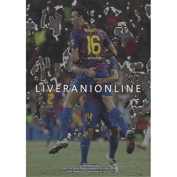 FC Barcelona\'s Sergio Busquets (f) and Javier Mascherano celebrates goal during Spanish Supercup 2nd match.August 17,2011. Photo: Acero / Alter / ALFAQUI Photo: Acero / Alter / ALFAQUI