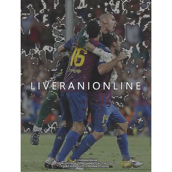FC Barcelona\'s Victor Valdes (c), Sergio Busquets (l) and Javier Mascherano celebrates goal during Spanish Supercup 2nd match.August 17,2011. Photo: Acero / Alter / ALFAQUI Photo: Acero / Alter / ALFAQUI