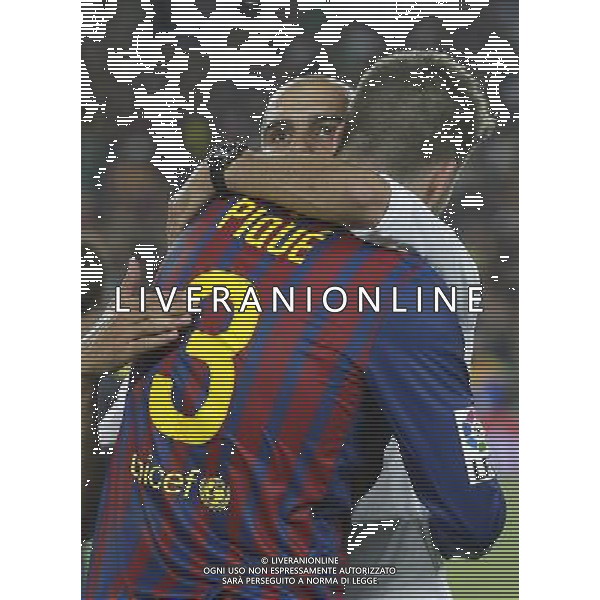 FC Barcelona\'s coach coach Pep Guardiola and Gerard Pique celebrates the victory during Spanish Supercup 2nd match.August 17,2011. Photo: Acero / Alter / ALFAQUI Photo: Acero / Alter / ALFAQUI