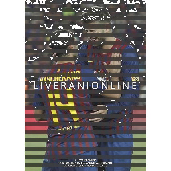 FC Barcelona\'s Javier Mascherano and Gerard Pique celebrates the victory during Spanish Supercup 2nd match.August 17,2011. Photo: Acero / Alter / ALFAQUI Photo: Acero / Alter / ALFAQUI