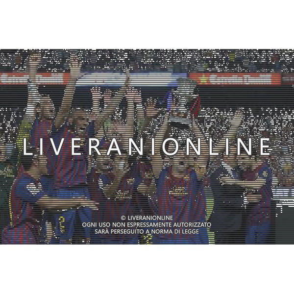 FC Barcelona\'s Adriano Correia, Sergio Busquets, Daniel Alves, Andres Iniesta, Pedro Rodriguez, Javier Mascherano, Eric Abidal, Xavi Hernandez, David Villa, Sandro Rossell and Cesc Fabregas celebrates the victory during Spanish Supercup 2nd match.August 17,2011. Photo: Acero / Alter / ALFAQUI Photo: Acero / Alter / ALFAQUI