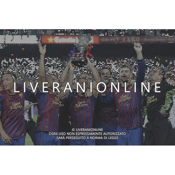 FC Barcelona\'s Adriano Correia, Daniel Alves, Andres Iniesta, Xavi Hernandez, David Villa, Cesc Fabregas, Gerard Pique and Jose Manuel Pinto celebrates the victory during Spanish Supercup 2nd match.August 17,2011. Photo: Acero / Alter / ALFAQUI Photo: Acero / Alter / ALFAQUI