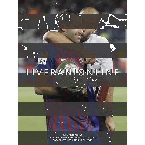 FC Barcelona\'s coach coach Pep Guardiola (r) and Javier Mascherano celebrates the victory during Spanish Supercup 2nd match.August 17,2011. Photo: Acero / Alter / ALFAQUI Photo: Acero / Alter / ALFAQUI