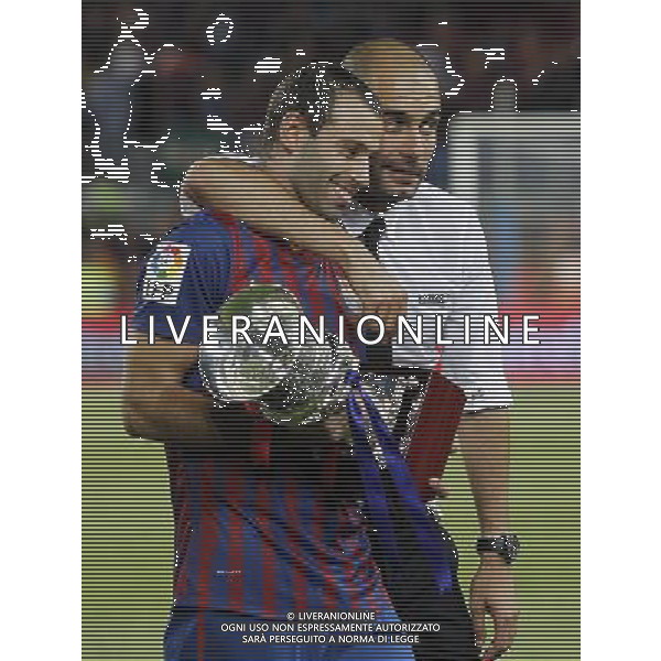 FC Barcelona\'s coach coach Pep Guardiola (r) and Javier Mascherano celebrates the victory during Spanish Supercup 2nd match.August 17,2011. Photo: Acero / Alter / ALFAQUI Photo: Acero / Alter / ALFAQUI
