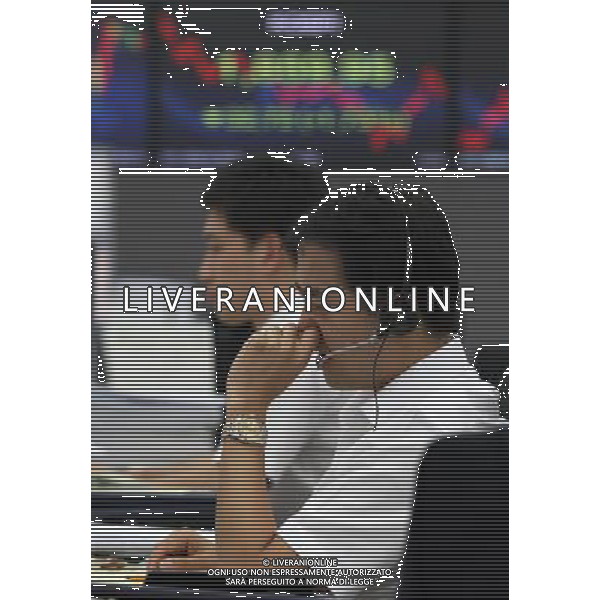 (110818) SEOUL, Aug. 18, 2011 Two traders work in front of a screen showing the Korea Composite Stock Price Index (KOSPI) at the Korea Exchange Bank headquarters in Seoul, South Korea, Aug. 18, 2011. The KOSPI fell 1.70 percent, or 32.09, to close at 1860.58. (/Park Jin hee) (lt)