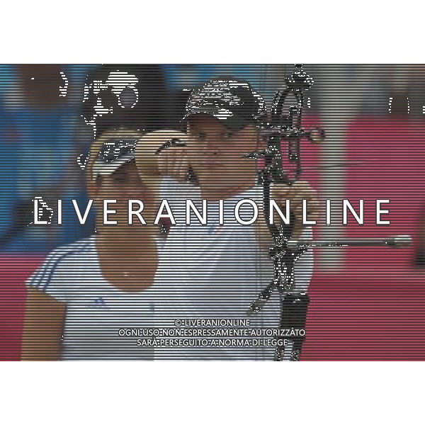(110818) -- SHENZHEN, Aug. 18, 2011 () -- Sebastien Brasseur of France competes during men\'s team compound of archery at the 26th Summer Universiade in Shenzhen, a city of south China\'s Guangdong Province, on Aug. 18, 2011. French team won the gold medal in the match. (/Lui Siu Wai)(wx)