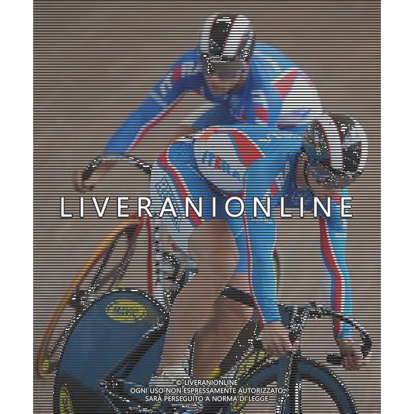 (110818) -- SHENZHEN, Aug. 18, 2011 () -- Denis Dmitriev of Russia and his compatriot Pavel Yakushevskiy (below) compete during men\'s sprint of cycling track at the 26th Summer Universiade in Shenzhen, a city of south China\'s Guangdong Province, on Aug. 18, 2011. Dmitriev won the gold medal and Yakushevskiy got the silver in the match. (/Li Ga)(wx)