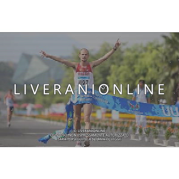 (110818) -- SHENZHEN, Aug. 18, 2011 () -- Andrey Krivov of Russia crosses the finish line during men\'s 20km walk of athletics at the 26th Summer Universiade in Shenzhen, a city of south China\'s Guangdong Province, on Aug. 18, 2011. Andrey Krivov claimed the gold medal with 1 hour 24 minutes 15 seconds. (/Liao Yujie)(wx)