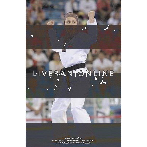 (110818) SHENZHEN, Aug. 18, 2011 Mahsa Mardani of Iran competes during the final of women\'s individual poomsae of taekwondo at the 26th Summer Universiade in Shenzhen, a city of south China\'s Guangdong Province Aug. 18, 2011. Mahsa Mardani took the silver with 8.47 points. (/Liang Xu)(wll)