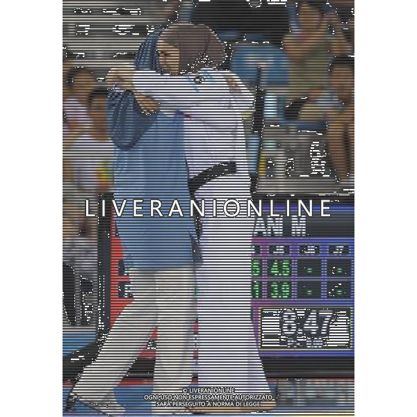 (110818) SHENZHEN, Aug. 18, 2011 Mahsa Mardani (R) of Iran hugs her coach after the final of women\'s individual poomsae of taekwondo at the 26th Summer Universiade in Shenzhen, a city of south China\'s Guangdong Province Aug. 18, 2011. Mahsa Mardani took the silver with 8.47 points. (/Liang Xu)(wll)