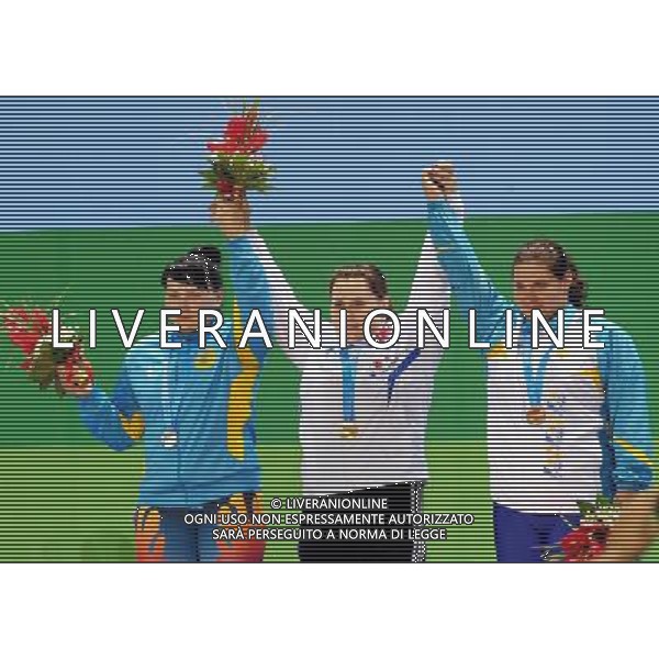 (110818) SHENZHEN, Aug. 18, 2011 Gold medalist Anastasia Chernykh of Russia (C), silver medalist Alexandra Aborneva of Kazakhstan (L), and bronze medalist Daryna Goncharova of Ukraine celebrate at the awarding ceremony of women\'s +75kg weightlifting competition at the 26th Summer Universiade in Shenzhen, a city of south China\'s Guangdong Province, Aug. 18, 2011. (/Wang Song)