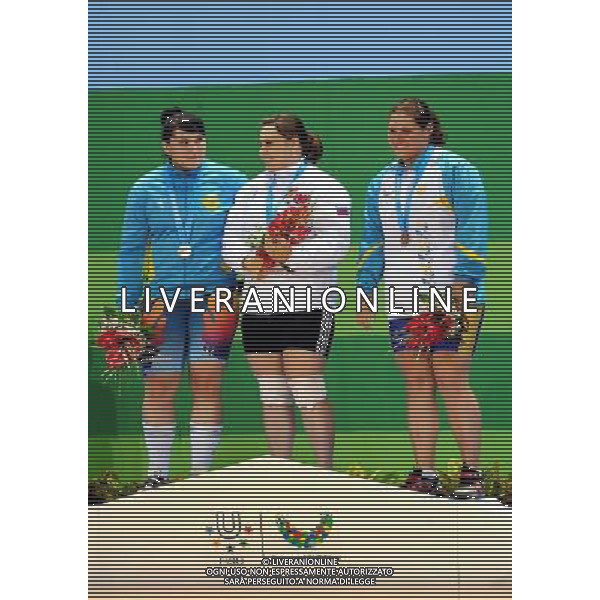 (110818) SHENZHEN, Aug. 18, 2011 Gold medalist Anastasia Chernykh of Russia (C), silver medalist Alexandra Aborneva of Kazakhstan (L), and bronze medalist Daryna Goncharova of Ukraine celebrate at the awarding ceremony of women\'s +75kg weightlifting competition at the 26th Summer Universiade in Shenzhen, a city of south China\'s Guangdong Province, Aug. 18, 2011. (/Wang Song)