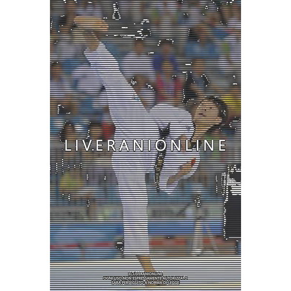(110818) SHENZHEN, Aug. 18, 2011 Zhu Yuxiang of China competes during the final of men\'s individual poomsae of taekwondo at the 26th Summer Universiade in Shenzhen, a city of south China\'s Guangdong Province Aug. 18, 2011. Zhu Yuxiang claimed the title with 8.65 points. (/Liang Xu)(wll)