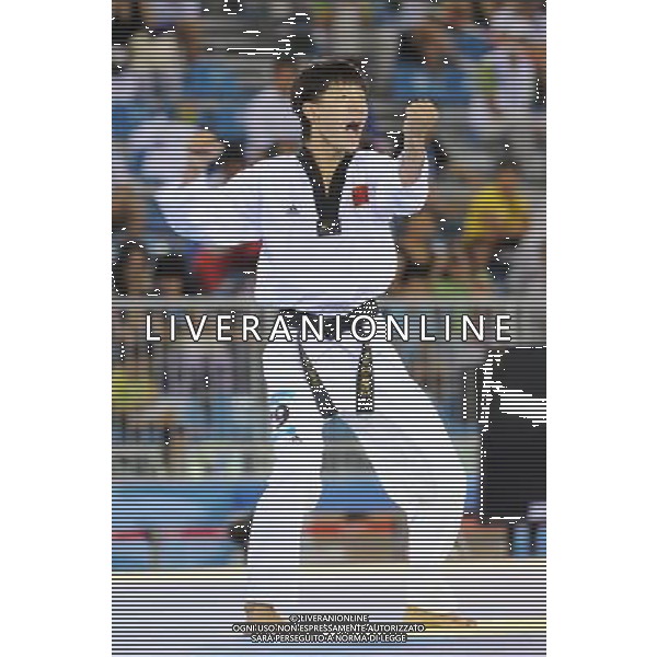 (110818) SHENZHEN, Aug. 18, 2011 Zhu Yuxiang of China competes during the final of men\'s individual poomsae of taekwondo at the 26th Summer Universiade in Shenzhen, a city of south China\'s Guangdong Province Aug. 18, 2011. Zhu Yuxiang claimed the title with 8.65 points. (/Liang Xu)(wll)
