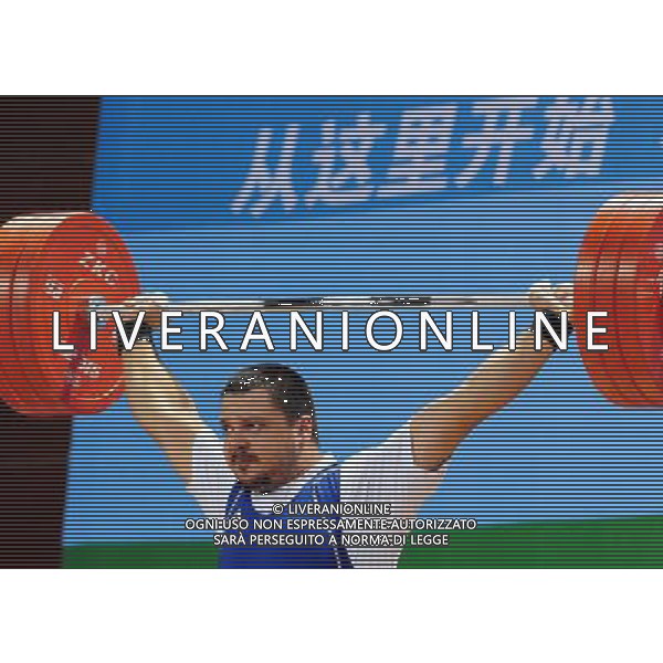 (110816) SHENZHEN, Aug. 16, 2011 Mykola Hordiychuk of Ukraine competes during the men\'s 105KG weightlifting final at the 26th Summer Universiade, in Shenzhen, a city of south China\'s Guangdong Province, Aug. 16, 2011. Hordiychuk won the silver medal with 382KG. (/Wang Song)(bxf)