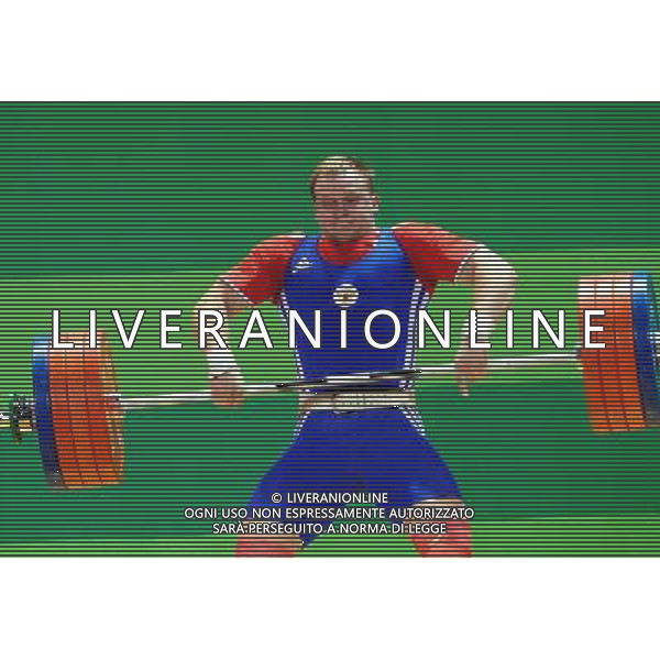 (110816) SHENZHEN, Aug. 16, 2011 Muratov Gennady of Russia competes during the men\'s 105KG weightlifting final at the 26th Summer Universiade, in Shenzhen, a city of south China\'s Guangdong Province, Aug. 16, 2011. Muratov Gennady won the gold medal with 400KG. (/Wang Song)(bxf)
