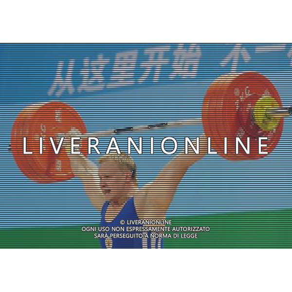 (110816) SHENZHEN, Aug. 16, 2011 Muratov Gennady of Russia competes during the men\'s 105KG weightlifting final at the 26th Summer Universiade, in Shenzhen, a city of south China\'s Guangdong Province, Aug. 16, 2011. Muratov Gennady won the gold medal with 400KG. (/Wang Song)(bxf)