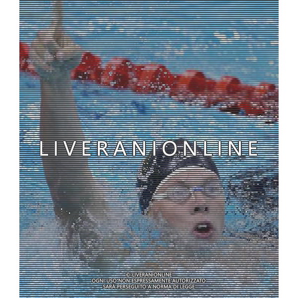 (110818) SHENZHEN, Aug. 18, 2011 Matthew Mc Lean of the United States gestures after the men\'s 200m freestyle final of swimming at the 26th Summer Universiade in Shenzhen, a city of south China\'s Guangdong Province, Aug. 18, 2011. Matthew Mc Lean claimed the gold of the event with a time of 1:47.44. (/Chen Jianli)