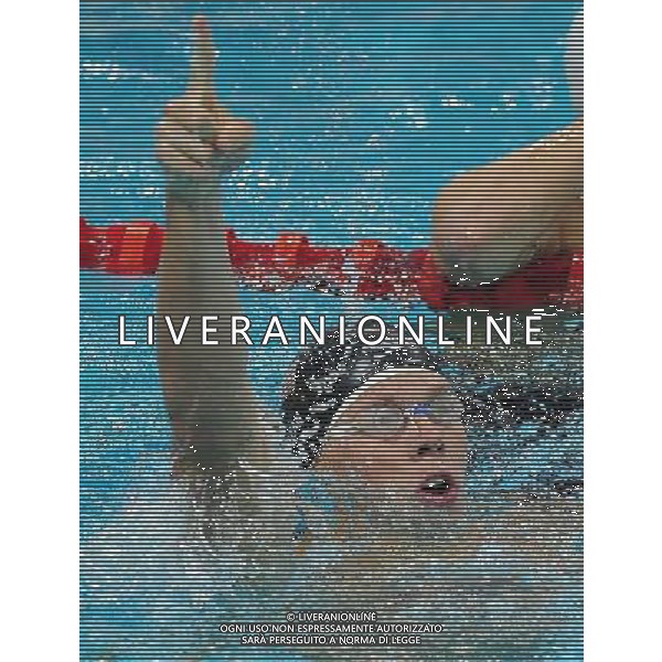 (110818) SHENZHEN, Aug. 18, 2011 Matthew Mc Lean of the United States gestures after finishing the men\'s 200m freestyle final of swimming at the 26th Summer Universiade in Shenzhen, a city of south China\'s Guangdong Province, Aug. 18, 2011. Matthew Mc Lean claimed the gold of the event with a time of 1:47.44. (/Lu Hanxin)