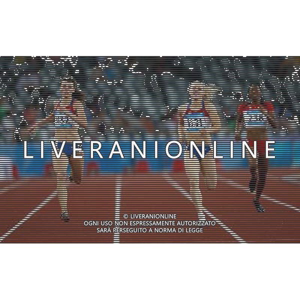(110818) -- SHENZHEN, Aug. 18, 2011 () -- Olga Topilskaya of Russia (L) competes during the women\'s 400M final race of athletics event at the 26th Summer Universiade, in Shenzhen, a city of south China\'s Guangdong Province, Aug. 18, 2011. Olga Topilskaya won the gold medal with 51.63 seconds. (/Li Ming) (bxf)