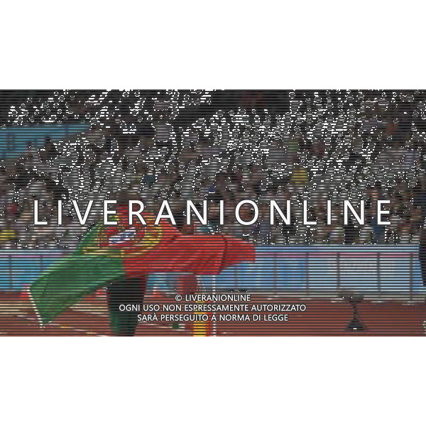 (110818) -- SHENZHEN, Aug. 18, 2011 () -- Nelson Evora of Portugal celebrates after winning the men\'s triple jump final of athletics event at the 26th Summer Universiade, in Shenzhen, a city of south China\'s Guangdong Province, Aug. 18, 2011. Nelson Evora won the gold medal with 17.31 meters. (/Li Ming) (bxf)