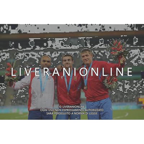 (110818) -- SHENZHEN, Aug. 18, 2011 () -- Gold medalist Vasiliy Kharlamov of Russia (C), silver medalist Gael Querin of France (L) and bronze medalist Mikhail Logvinenko of Russia celebrate during the awarding ceremony for the men\'s Decathlon match of athletics event at the 26th Summer Universiade, in Shenzhen, a city of south China\'s Guangdong Province, Aug. 18, 2011. (/Li Ming) (bxf)