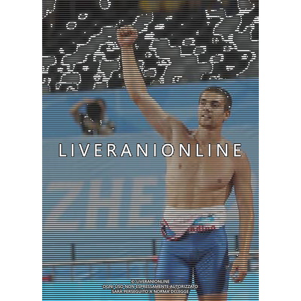 (110818) -- SHENZHEN, Aug. 18, 2011 () -- Vasiliy Kharlamov of Russia celebrates after the men\'s decathlon 1500M race of athletics event at the 26th Summer Universiade, in Shenzhen, a city of south China\'s Guangdong Province, Aug. 18, 2011. Vasiliy Kharlamov won the gold medal of men\'s decathlon. (/Li Ming) (bxf)