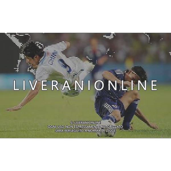 (110818) -- SHENZHEN, Aug. 18, 2011 () -- Guo Yuantong of China vies during the men\'s football quarterfinal against Japan at the 26th Summer Universiade, in Shenzhen, a city of south China\'s Guangdong Province, Aug. 18, 2011. Japan won 3-2 to enter the semifinals. (/Li Ga)(bxf)