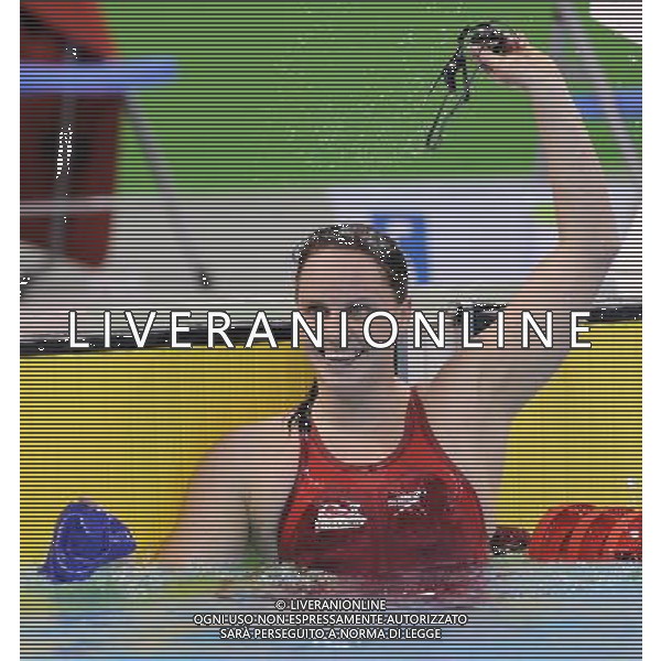 (110818) -- SHENZHEN, Aug. 18, 2011 () -- Jessica Dickons of Great Britain gestures after finishing the women\'s 200m butterfly final of swimming at the 26th Summer Universiade in Shenzhen, a city of south China\'s Guangdong Province, Aug. 18, 2011. Jessica Dickons claimed the gold of the event with a time of 2:08.91. (/Liang Xu)