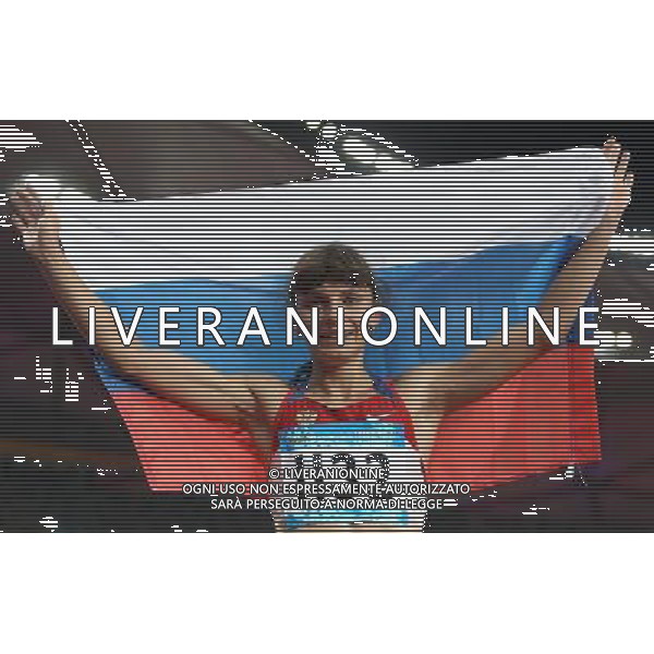 (110818) -- SHENZHEN, Aug. 18, 2011 () -- Olga Topilskaya of Russia celebrates after winning the women\'s 400M final race of athletics event at the 26th Summer Universiade, in Shenzhen, a city of south China\'s Guangdong Province, Aug. 18, 2011. Olga Topilskaya won the gold medal with 51.63 seconds. (/Liao Yujie) (bxf)