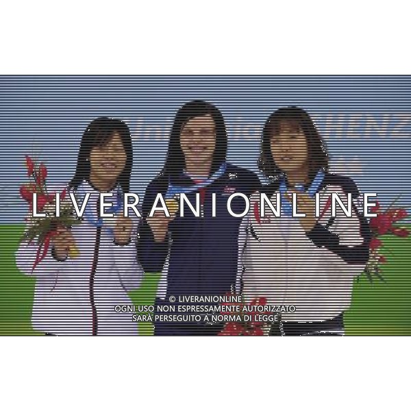 (110818) -- SHENZHEN, Aug. 18, 2011 () -- Gold medalist Jessica Dickons of Great Britain (C), silver medalist Natsumi Hoshi of Japan (L) and bronze medalist Choi Hye Ra of South Korea pose on the podium at the awarding ceremony of women\'s 200m butterfly of swimming event at the 26th Summer Universiade in Shenzhen, a city of south China\'s Guangdong Province, Aug. 18, 2011. (/Liang Xu)