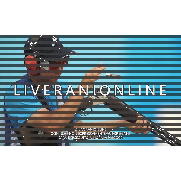 (110819) -- SHENZHEN, Aug. 19, 2011 () -- Lee Jae Sung of South Korea competes during men\'s trap of shotgun at the 26th Summer Universiade in Shenzhen, a city of south China\'s Guangdong Province, on Aug. 19, 2011. Men\'s trap entered its second day match Friday. (/Lin Yiguang)(wx)