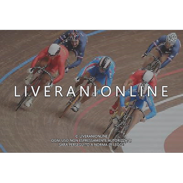(110819) -- SHENZHEN, Aug. 19, 2011 () -- Zhang Miao (1st L) of China and Pavel Yakushevskiy (1st R) of Russia compete during men\'s keirin of cycling track at the 26th Summer Universiade in Shenzhen, a city of south China\'s Guangdong Province, on Aug. 19, 2011. Zhang Miao won the gold medal and Pavel Yakushevskiy got the silver in the match. (/Li Ga)(wx)