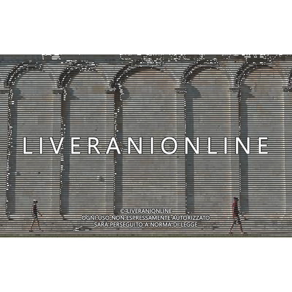 (110819) -- ROME, Aug. 19, 2011 () -- Photo taken on Aug. 17, 2011 shows the wall of the cemetery at the Duomo Square (Piazza del Duomo) in Pisa, central Italy. Standing in a large green expanse, Piazza del Duomo houses a group of monuments well-known all over the world. The four masterpieces of medieval architecture, the cathedral, the baptistry, the campanile (the \'Leaning Tower\') and the cemetery had a great influence on monumental art in Italy from the 11th to the 14th century. The UNESCO inscribed the Piazza del Duomo of Pisa in the World Heritage List in 1987. (/Wang Qingqin) (yc)