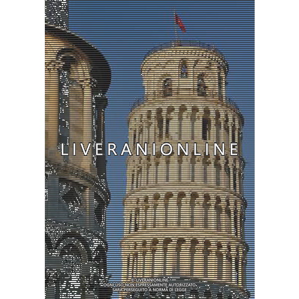 (110819) -- ROME, Aug. 19, 2011 () -- Photo taken on Aug. 17, 2011 shows the campanile (the \'Leaning Tower\') next to the cathedral at the Duomo Square (Piazza del Duomo) in Pisa, central Italy. Standing in a large green expanse, Piazza del Duomo houses a group of monuments well-known all over the world. The four masterpieces of medieval architecture, the cathedral, the baptistry, the campanile (the \'Leaning Tower\') and the cemetery had a great influence on monumental art in Italy from the 11th to the 14th century. The UNESCO inscribed the Piazza del Duomo of Pisa in the World Heritage List in 1987. (/Wang Qingqin) (yc)