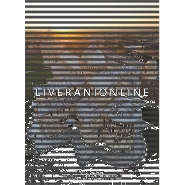 (110819) -- ROME, Aug. 19, 2011 () -- Photo taken on Aug. 17, 2011 shows the view of the Duomo Square (Piazza del Duomo) from the top of the campanile (the \'Leaning Tower\') in Pisa, central Italy. Standing in a large green expanse, Piazza del Duomo houses a group of monuments well-known all over the world. The four masterpieces of medieval architecture, the cathedral, the baptistry, the campanile (the \'Leaning Tower\') and the cemetery had a great influence on monumental art in Italy from the 11th to the 14th century. The UNESCO inscribed the Piazza del Duomo of Pisa in the World Heritage List in 1987. (/Wang Qingqin) (yc)