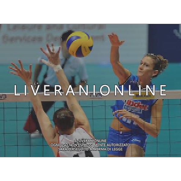(110819) -- HONG KONG, Aug. 19, 2011 () -- Lucia Bosetti (R) of Italy spikes the ball during the Group J match of the women\'s World Grand Prix Hong Kong session between Italy and Peru at Hong Kong Coliseum in Hong Kong, south China, Aug. 19, 2011. Italy won 3-0. (/Lo Ping Fai)
